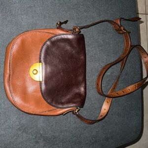 Brown/ tan fossil satchel.